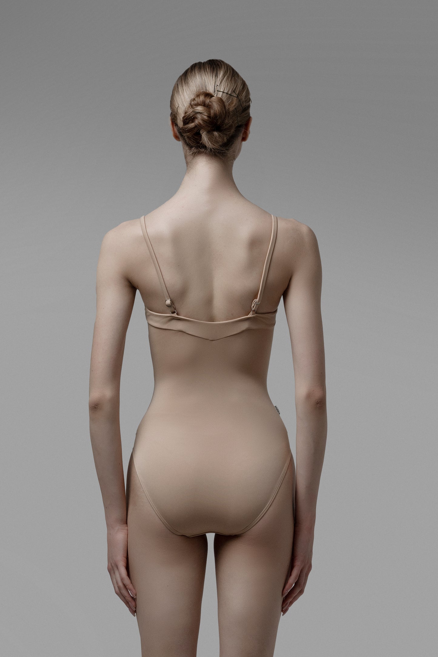 Elegant nude ballet leotard with adjustable thin straps