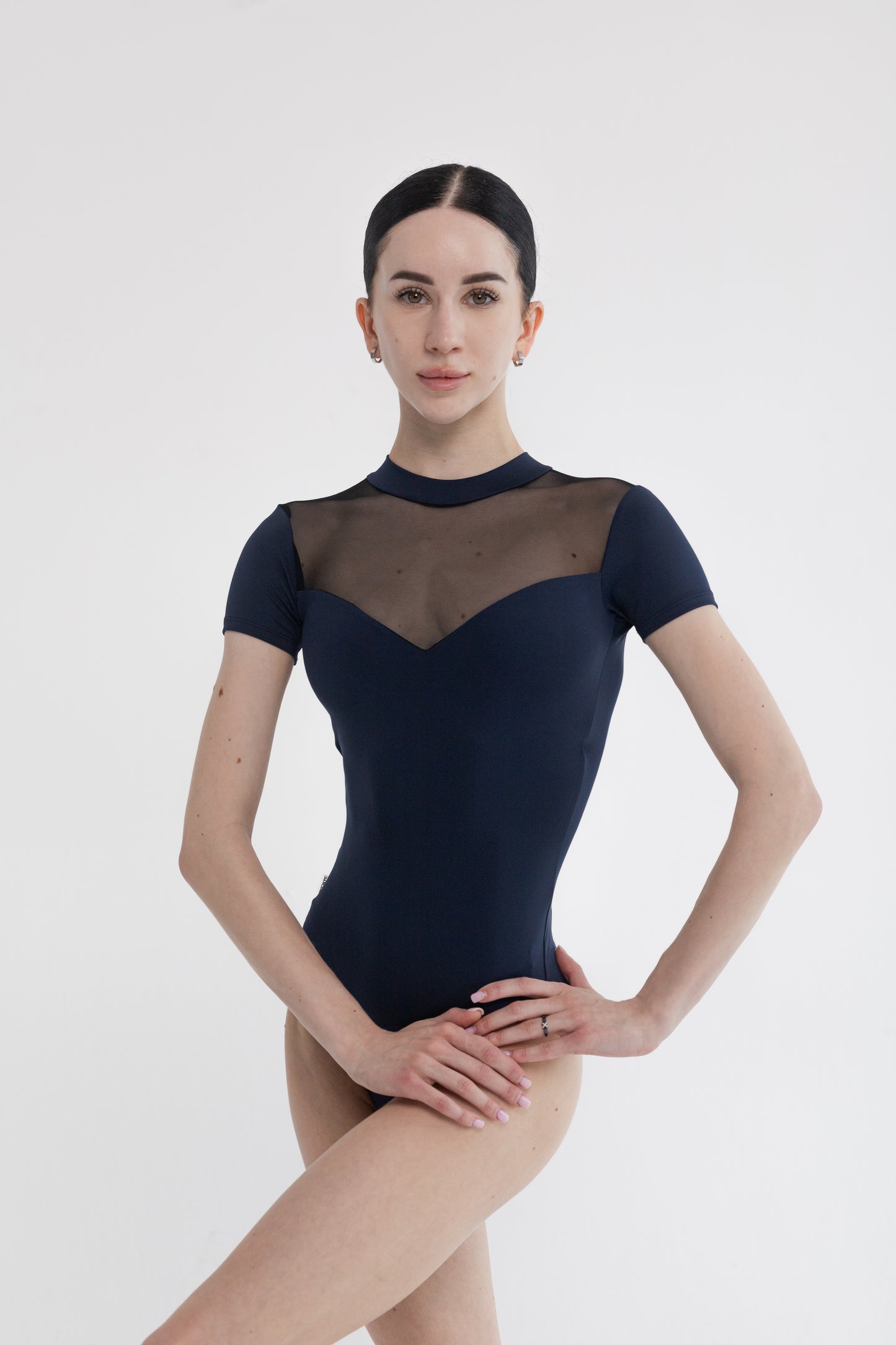 Dancelab Basic Ballerina wearing a navy blue leotard with sheer mesh