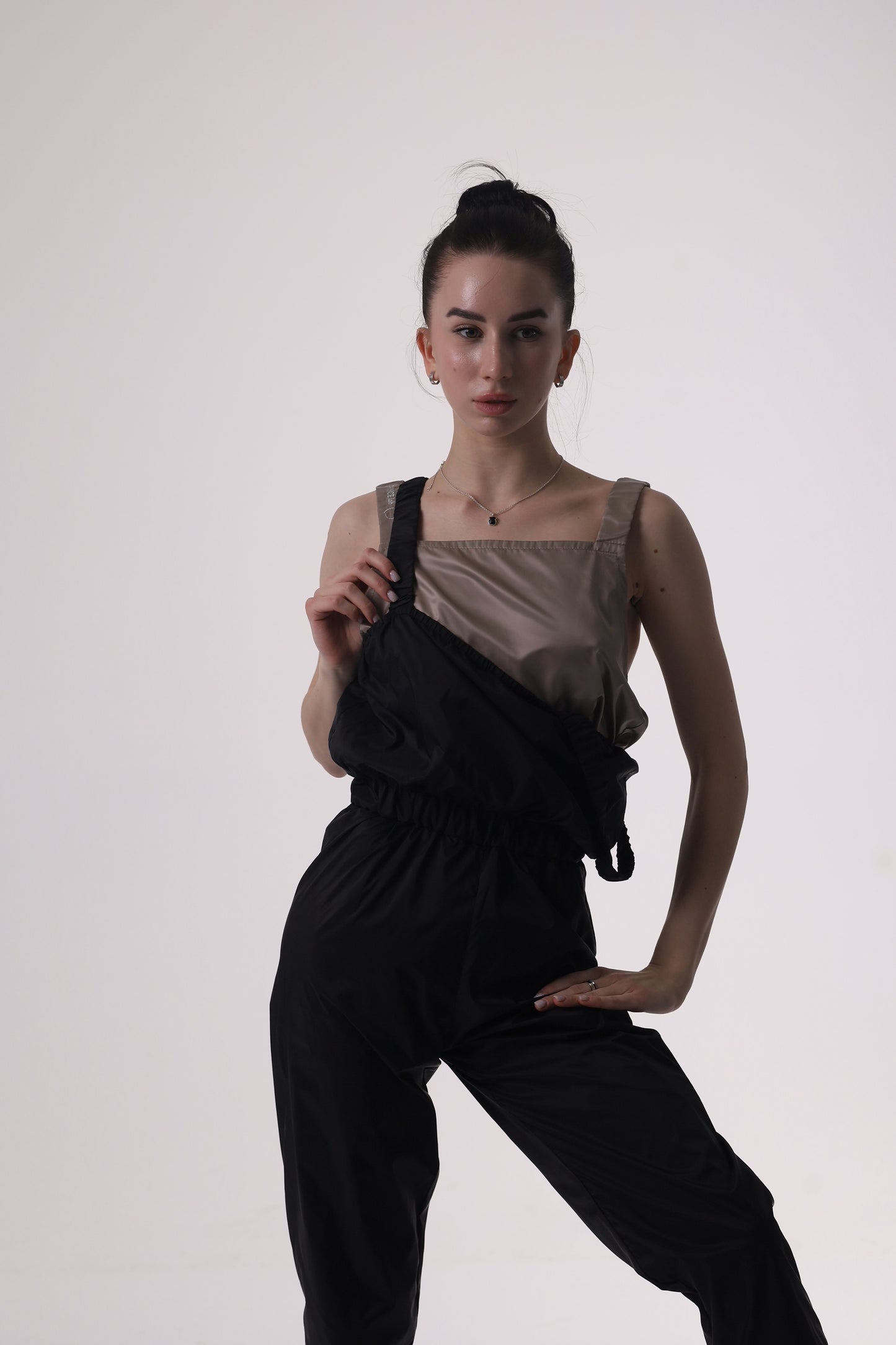 Dancer posing Dancelab sauna overalls 2 pieces