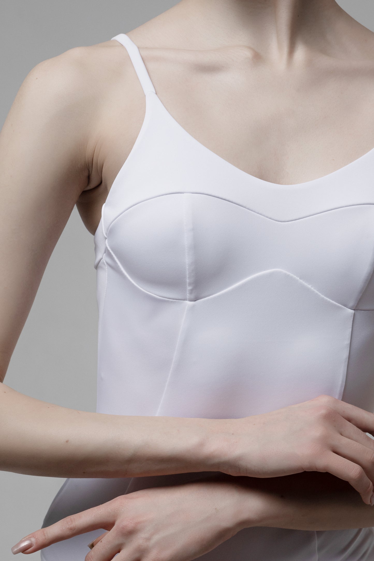 beautiful white leotard with an interesting cut