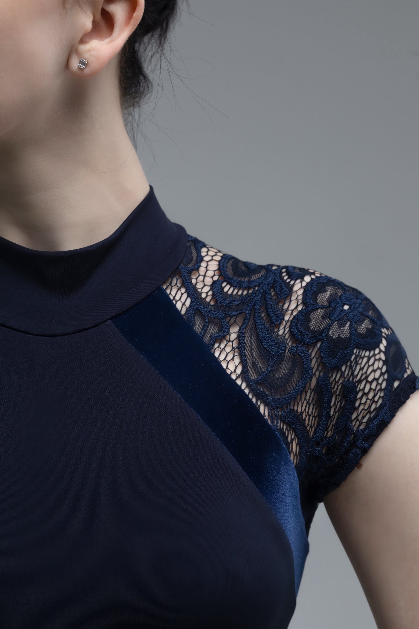 Navy blue leotard with lace sleeves