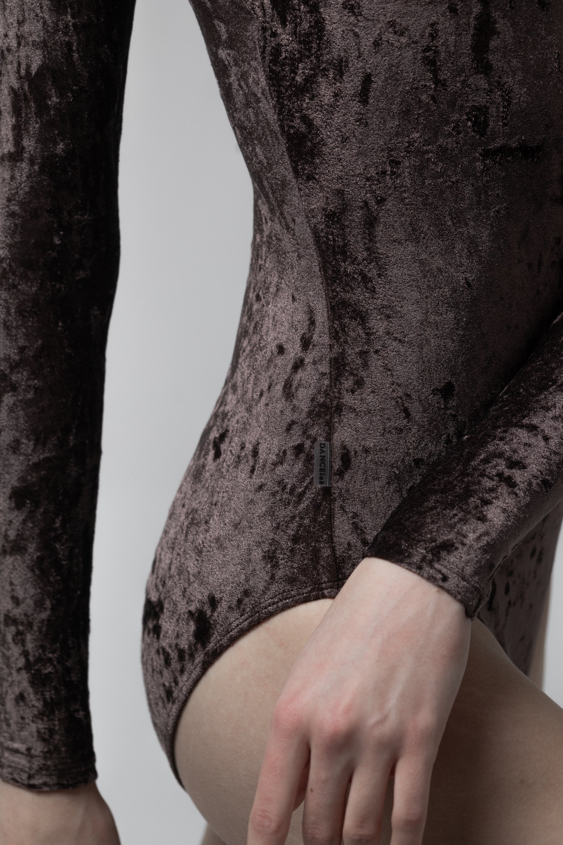 Dancelab brown leotard on a plain background