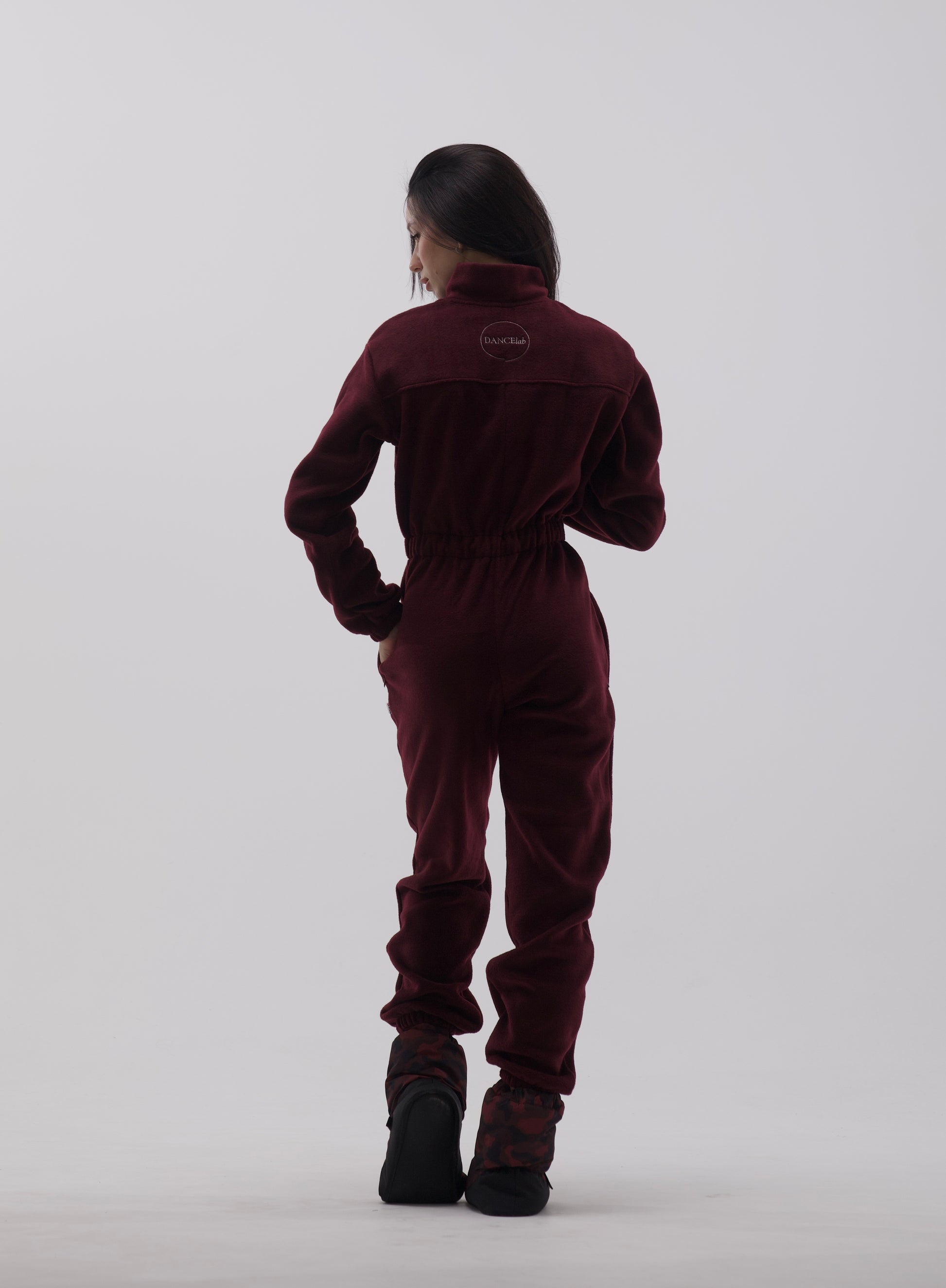 Girl wearing Dancelab fleece overalls red color