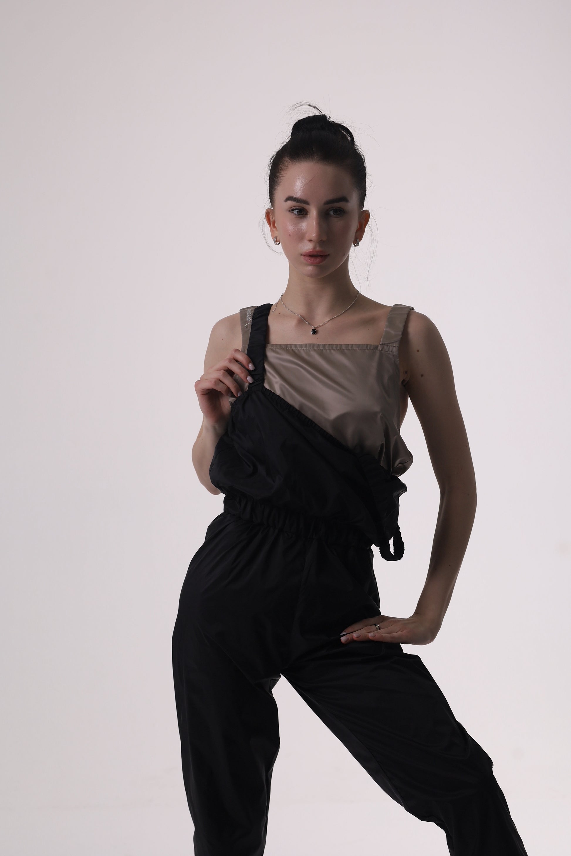 Dancer posing Dancelab sauna overalls 2 pieces