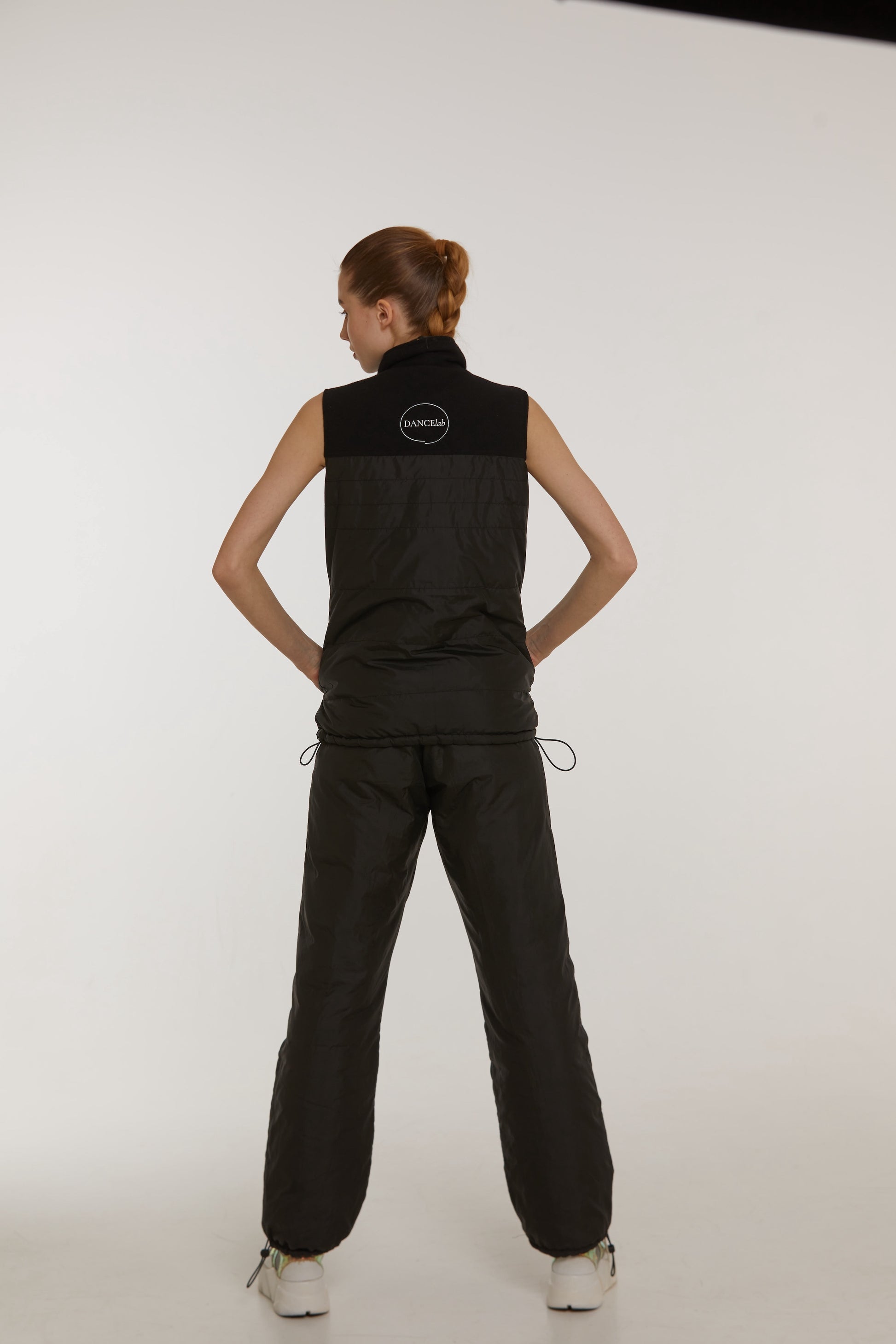 Girl wearing Dancelab warm-up suit 2 sides black color