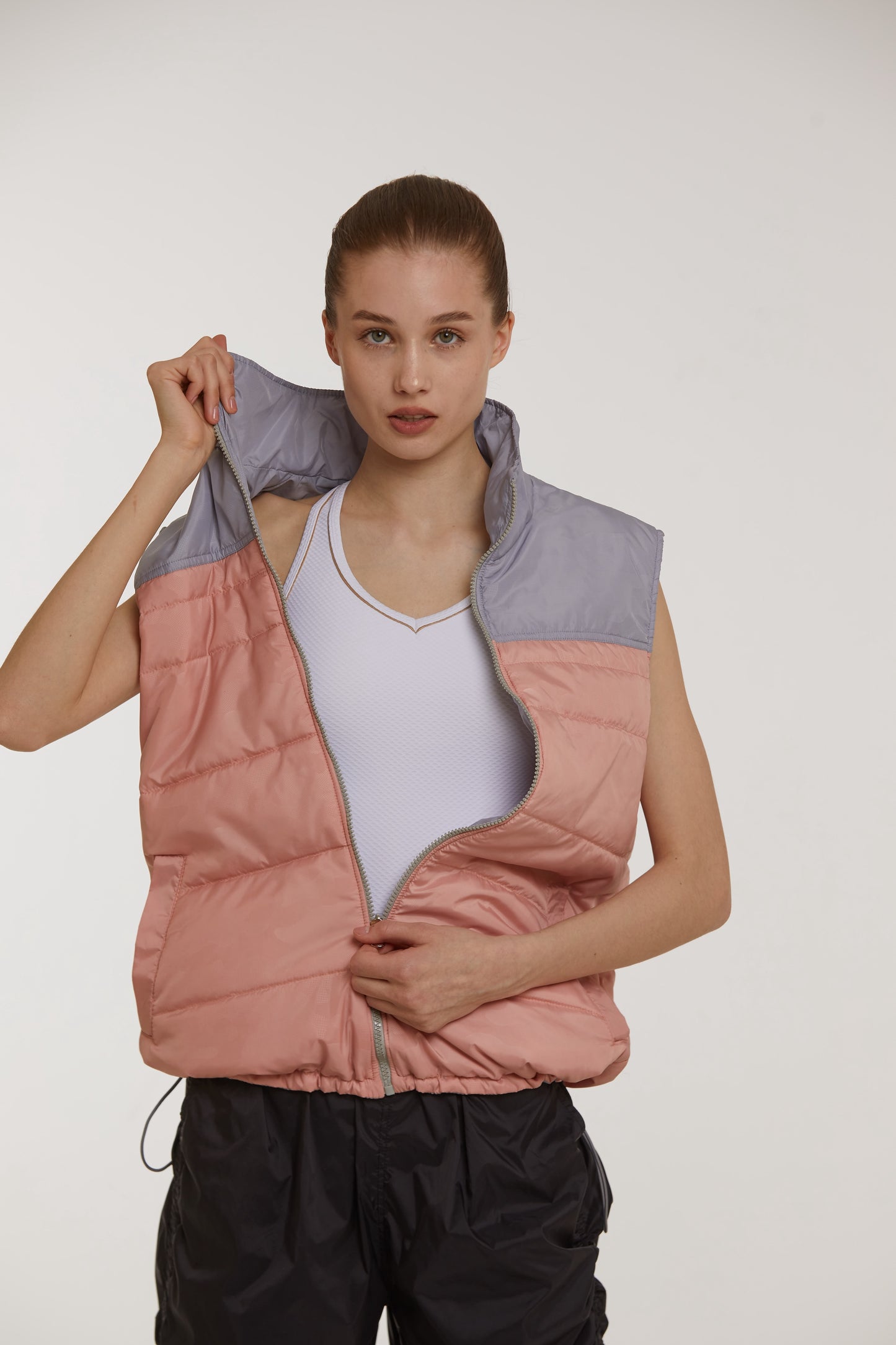 Balerina wearing Dancelab warm-up jacket pink color