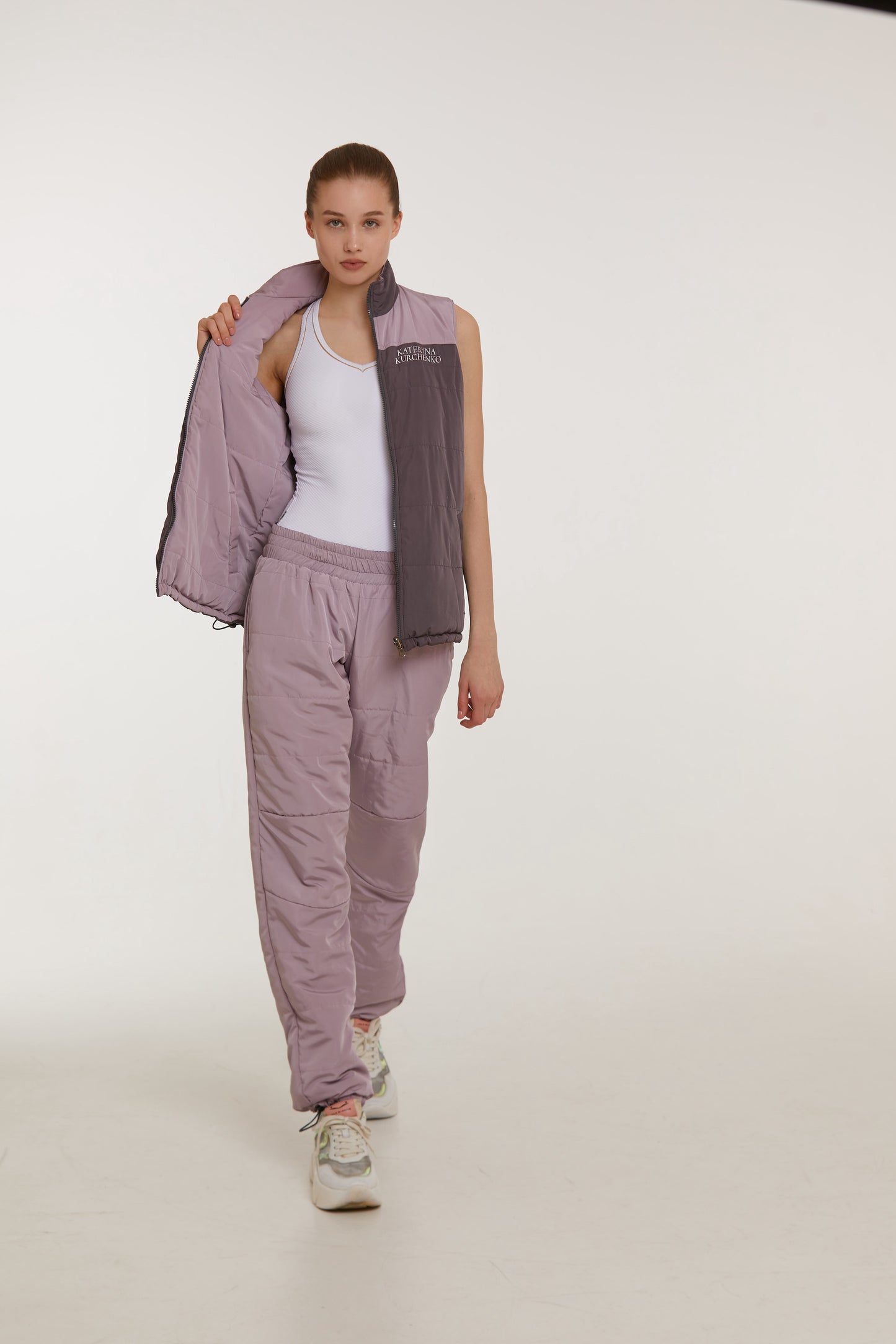 Girl wearing Dancelab stylish warm-up suit