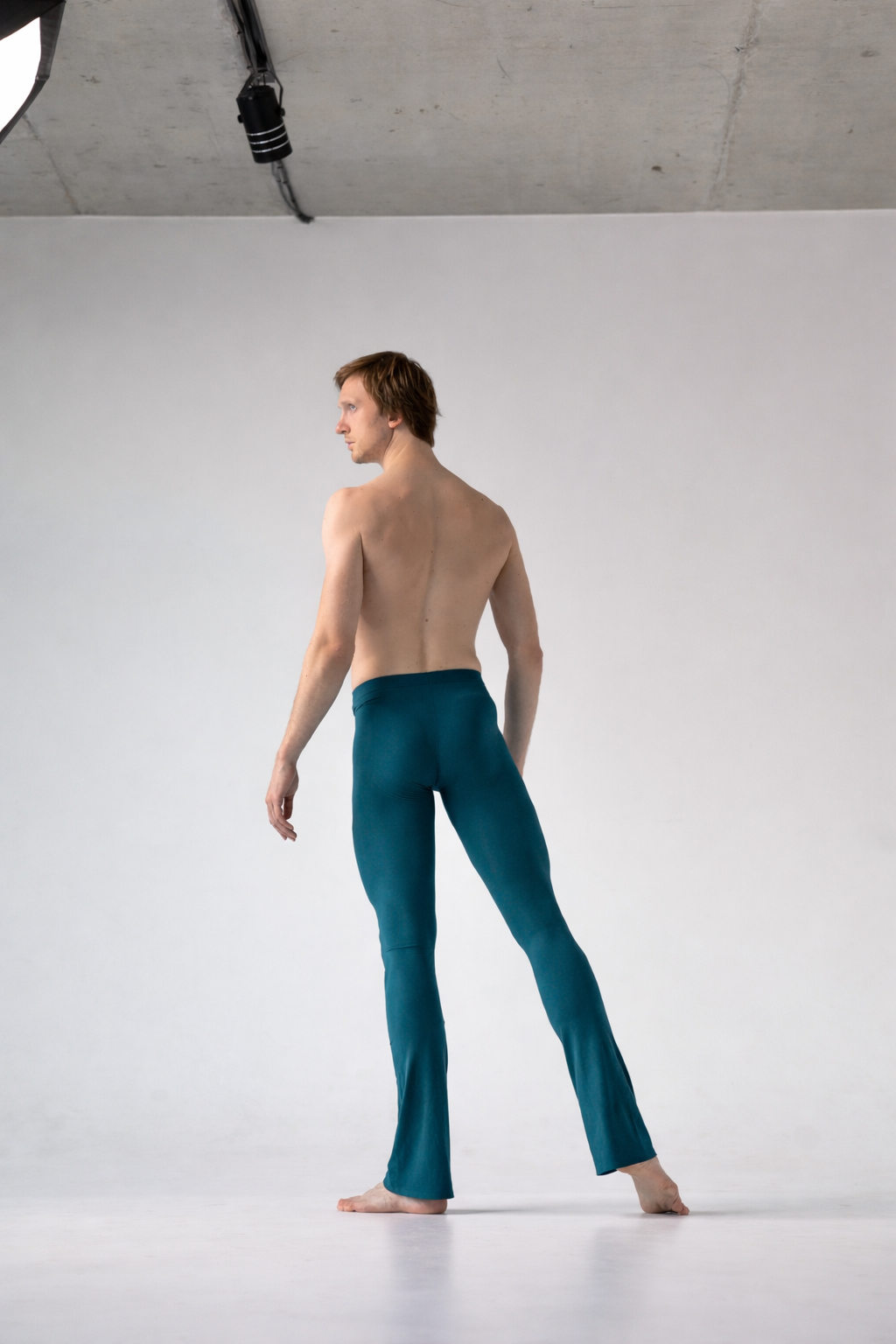 Man wearing ballet pants teal color