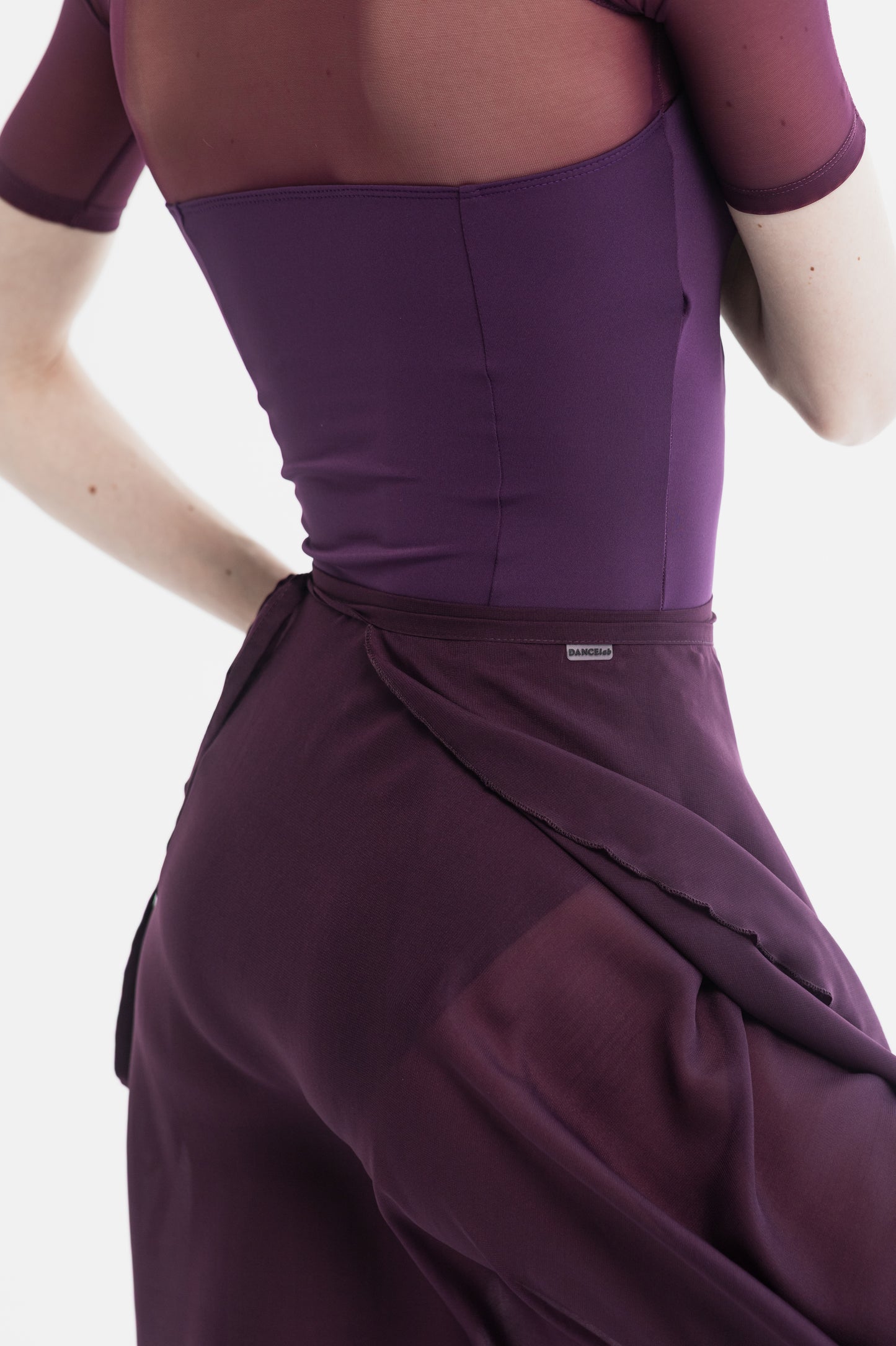 Marsala skirt with a brand label on a ballerina